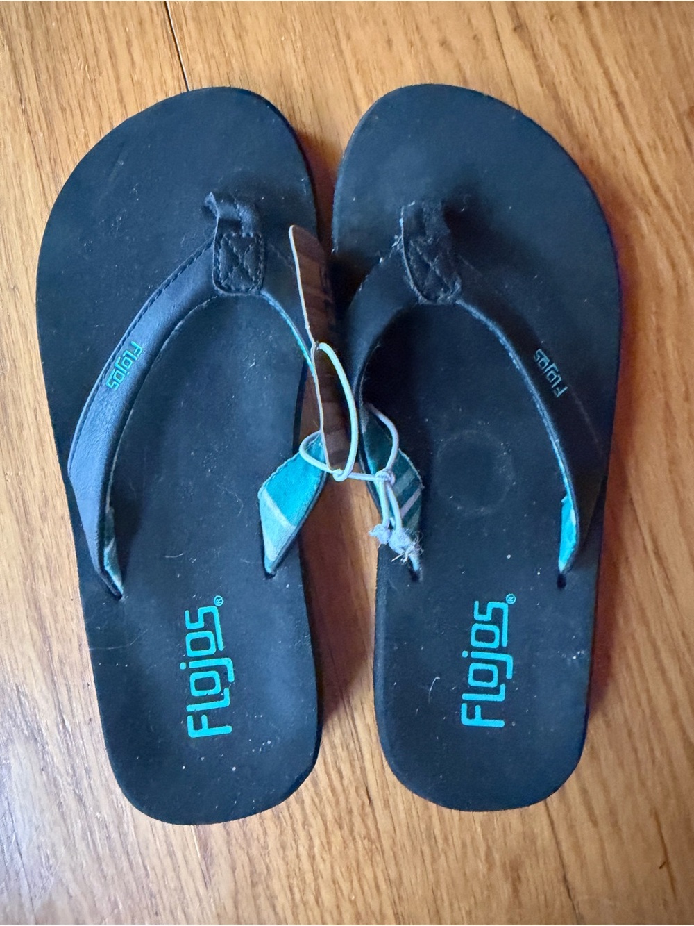 Flojos Black Flip Flops with Teal Accents
